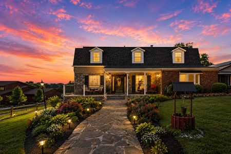1. 933 River Rd. Twilight charm in a cozy suburb