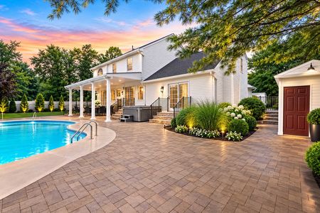 10. 5 Gates Pl. Luxurious backyard at twilight