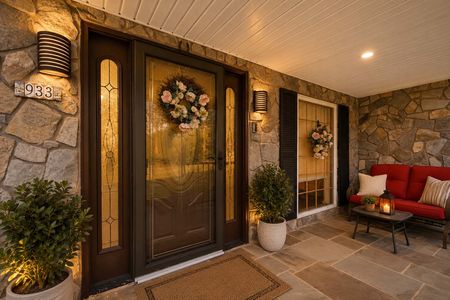 11. 933 River Rd. Cozy evening porch entryway scene