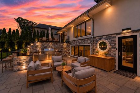 12. 35 Jane Sundown glow over modern patio setting