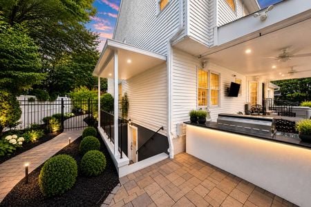 12. 5 Gates Pl Modern suburban patio at dusk