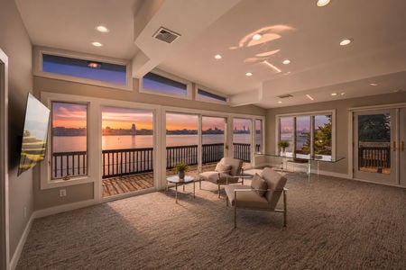 13. 35 Shore Sunset view from a modern living room