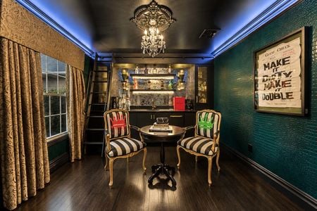 14. 5 Gates Pl. Elegant lounge with vintage flair