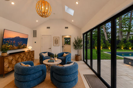 15. 35 Jane Cozy modern living room with pool view