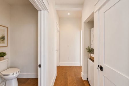 15. 67 E Clinton Minimalist hallway with warm lighting