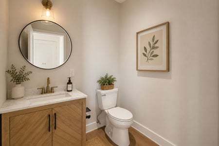 16. 67 E Clinton Serene minimalist bathroom with elegant touches