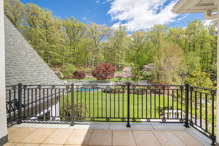 Back yard balcony view at 159 Anderson Ave Alpine NJ Proper
