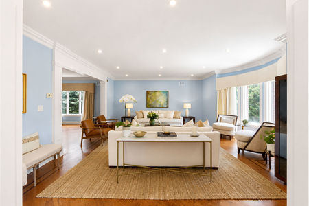 18. 335 Riverdale Elegant, airy living room with artwork