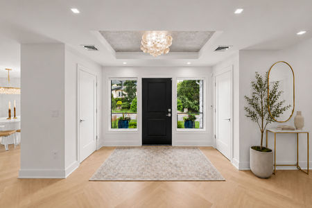 18. 35 Jane Modern minimalist entryway with gold accents