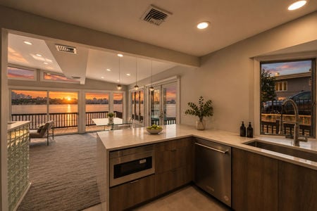 18. 35 Shore Modern waterfront kitchen with sunset view