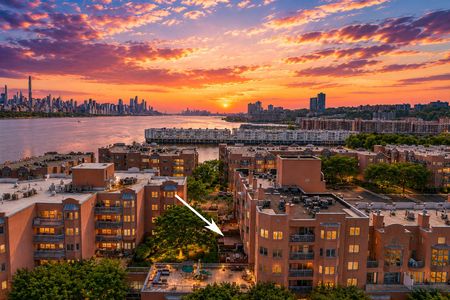 2. 303B Nelson Sunset over urban waterfront cityscape