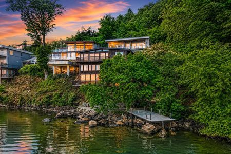 2. 35 Shore Cozy lakeside homes at sunset