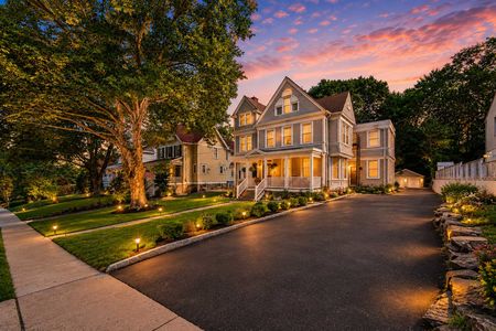 2. 67 E Clinton Golden hour over a suburban street