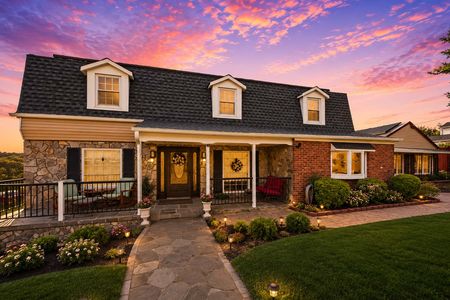 2. 933 River Rd. Charming suburban home at sunset