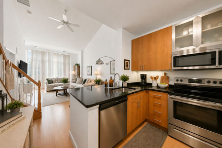 20. 26 Ave Port Imperial Modern home interior with cozy kitchen