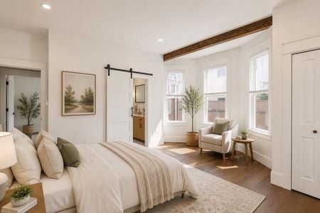 20. 67 E Clinton Modern bedroom with natural light