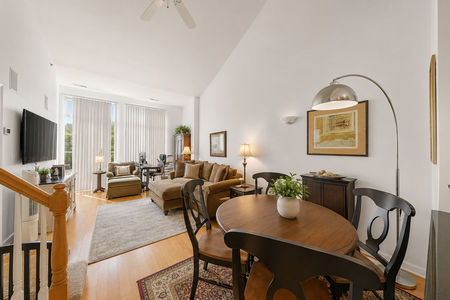 23. 26 Ave Port Imperial Cozy modern living space with natural light