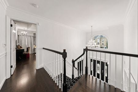 23. 5 Gates Pl Elegant hallway with crystal chandelier