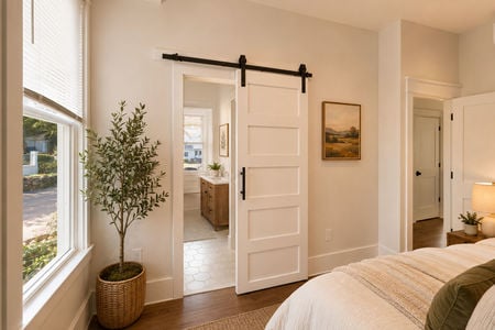 23. 67 E Clinton Cozy minimalist bedroom with barn door