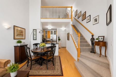 25. 26 Ave Port Imperial Bright modern living and dining space