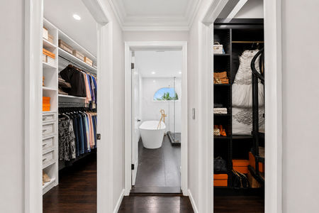 25. 5 Gates Pl. Elegant hallway leading to modern bathroom