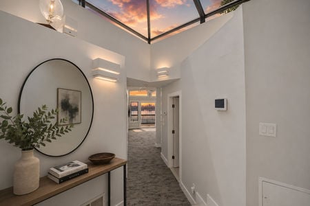 26. 35 Shore Minimalist hallway with sunset view