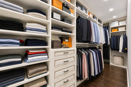 28. 5 Gates Pl Luxury walk-in closet with designer accessories
