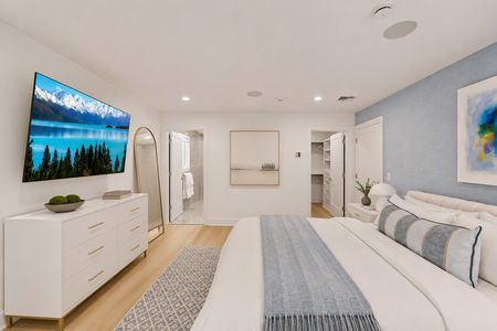 29. 35 Jane Serene modern bedroom with blue accents