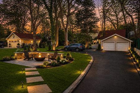 3. 69 E Clinton #A Peaceful suburban backyard at sunset