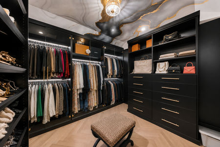 30. 5 Gates Pl. Luxurious walk-in closet with designer pieces