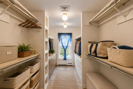 30. 933 River Rd. Tidy walk-in closet with serene decor
