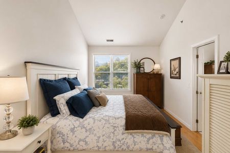 31. 26 Ave Port Imperial Cozy modern bedroom with natural light