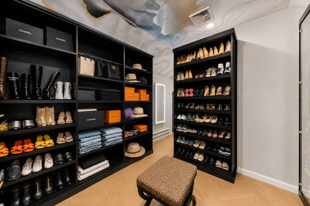 31. 5 Gates Pl. Luxury walk-in closet with designer accessories