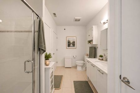 32. 26 Ave Port Imperial Modern minimalist bathroom with natural accents