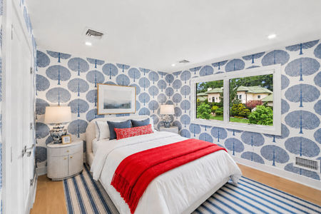 32. 35 Jane Coastal-inspired bedroom with vibrant accents