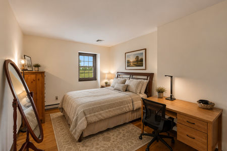 32. 933 River Rd. Cozy modern farmhouse bedroom interior