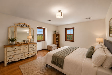 33. 933 River Rd. Cozy farmhouse-inspired bedroom interior
