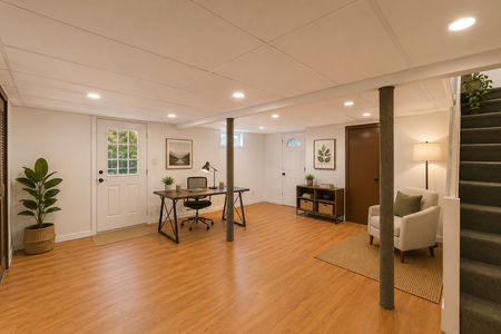 35. 933 River Rd. Modern basement office with cozy lounge area
