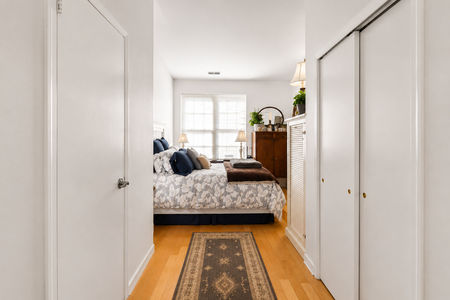 36. 26 Ave Port Imperial Cozy bedroom hallway with modern decor