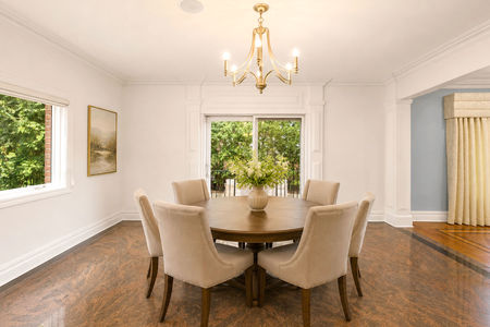 36. 335 Riverdale Elegant dining room with lush greenery