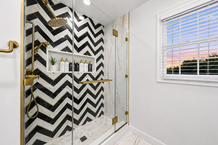 38. 5 Gates PlElegant shower with sunset view