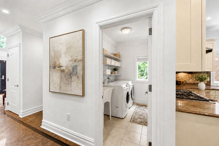 39. 335 Riverdale Modern hallway with laundry and kitchen views