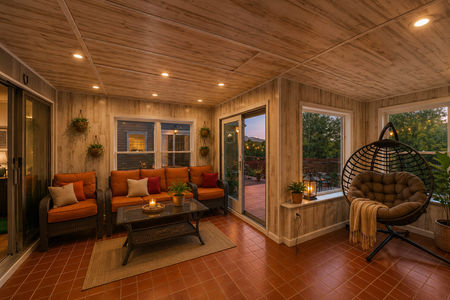 39. 933 River Rd. Cozy sunroom with rustic charm