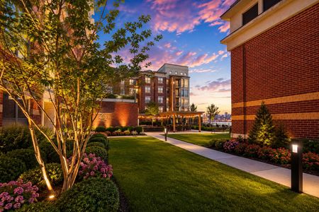 4. 26 Ave Port Imperial Tranquil courtyard at golden hour