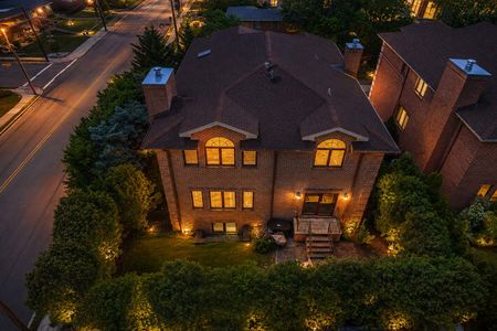 4. 334 Riverdale Twilight in a suburban neighborhood