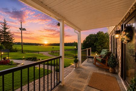 4. 933 River Rd. Cozy porch view at sunset