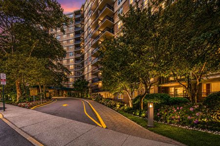 42. 2200 N Central Elegant entrance at twilight with sunset hues