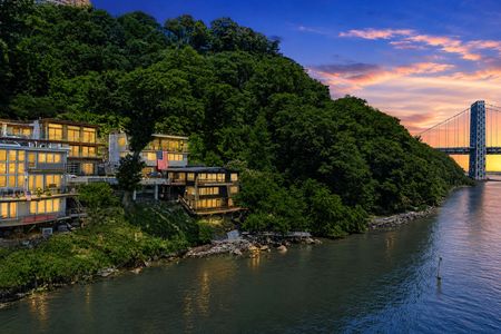 42. 35 Shore Twilight riverfront with glowing homes