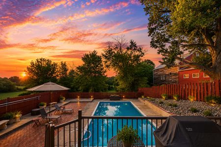 42. 933 River Rd. Serene backyard oasis at sunset