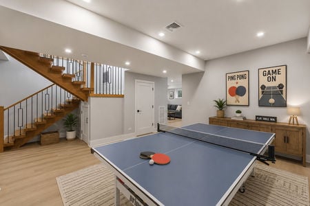 43. 14 Allison Modern basement with ping-pong table